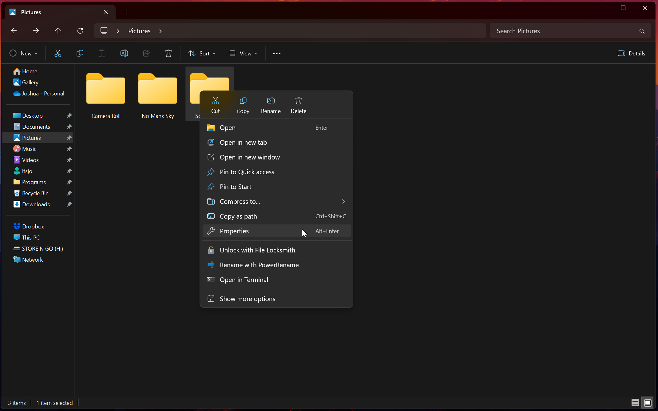 پنجره File Explorer با مکان نما در گزینه Properties یک منوی کلیک راست از پوشه تصاویر در حال حرکت است