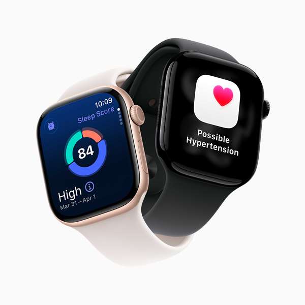 دو مدل معلق Apple Watch سری 11. یکی بند سفید دارد و آیکون امتیاز خواب به شکل نمودار دایره‌ای با عدد «84» در وسط نشان می‌دهد. دیگری بند سیاه دارد و آیکون مربع سفید برنامه Health را دارد که یک قلب صورتی در گوشه بالا‑راست دارد.