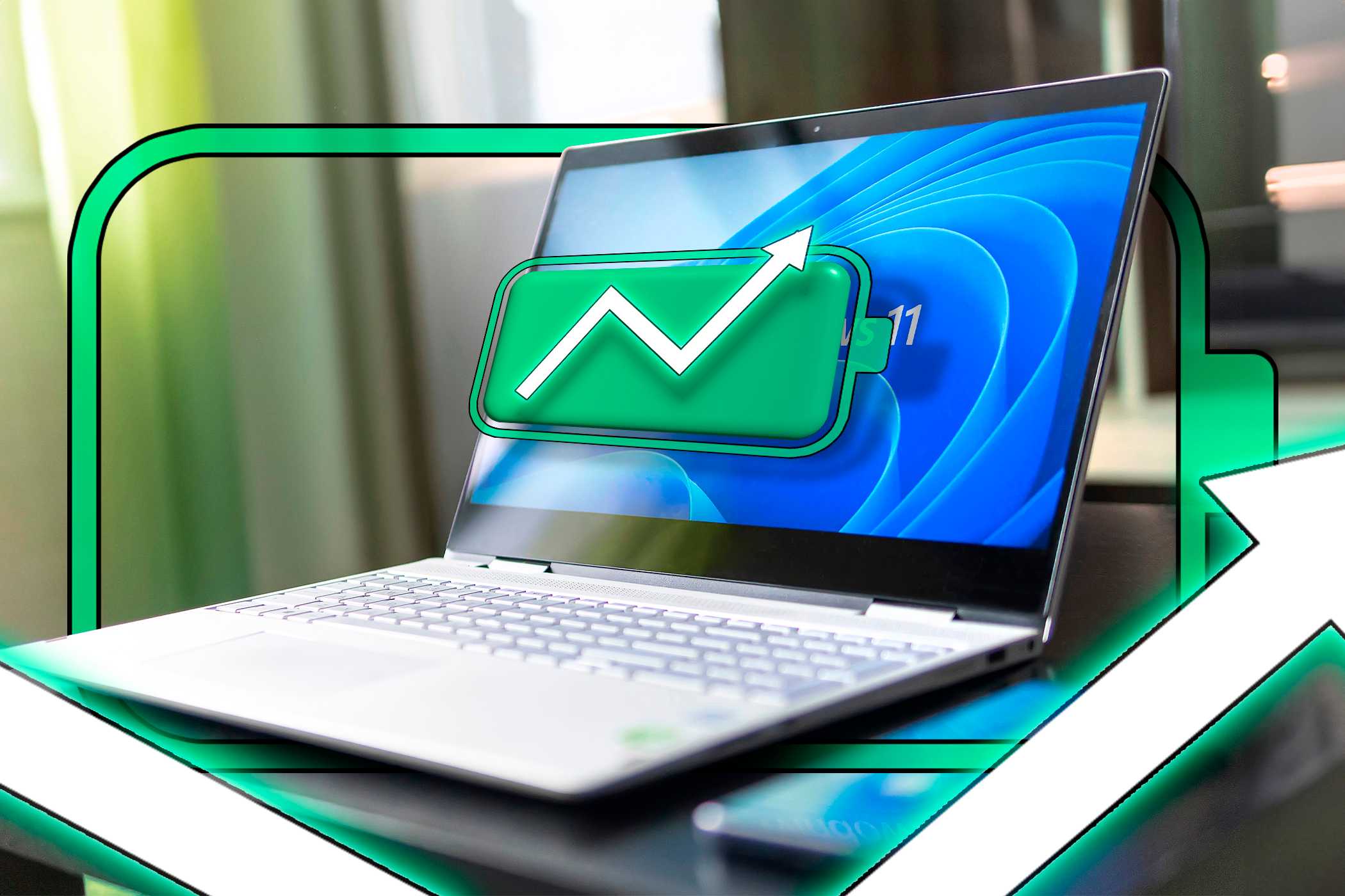 یک لپ‌تاپ با ویندوز ۱۱ که یک آیکون باتری پر و یک پیکان بالا نشان‌دهنده افزایش باتری را نمایش می‌دهد.