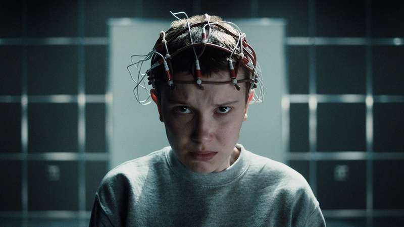 Eleven with cables all over her head in Stranger Things season 4