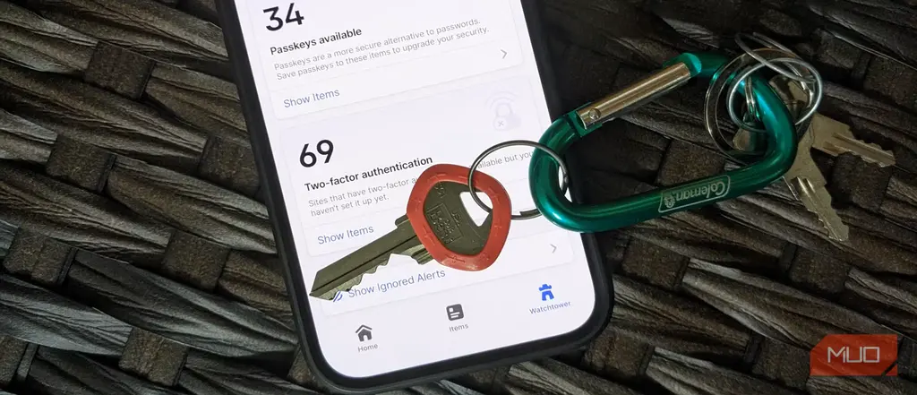 درخواست کلید عبور 1Password روی آیفون با کلیدک در نزدیکی دستگاه