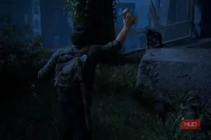 نمایی از Joel در بازی The Last of Us Part I در موقعیتی پرتنش با یک Infected.