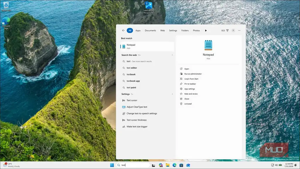 نتایج جستجوی ویندوز ۱۱ برای برنامه Notepad با پسزمینه صخرههای ساحلی