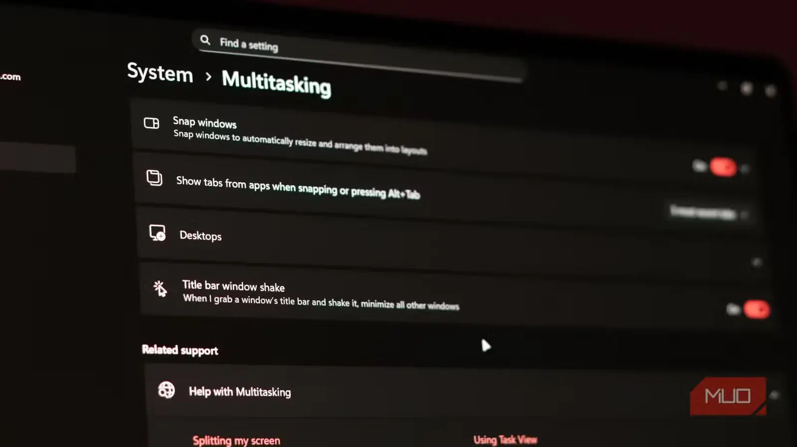 نمای تنظیم تکاندادن پنجره از نوار عنوان در Windows 11
